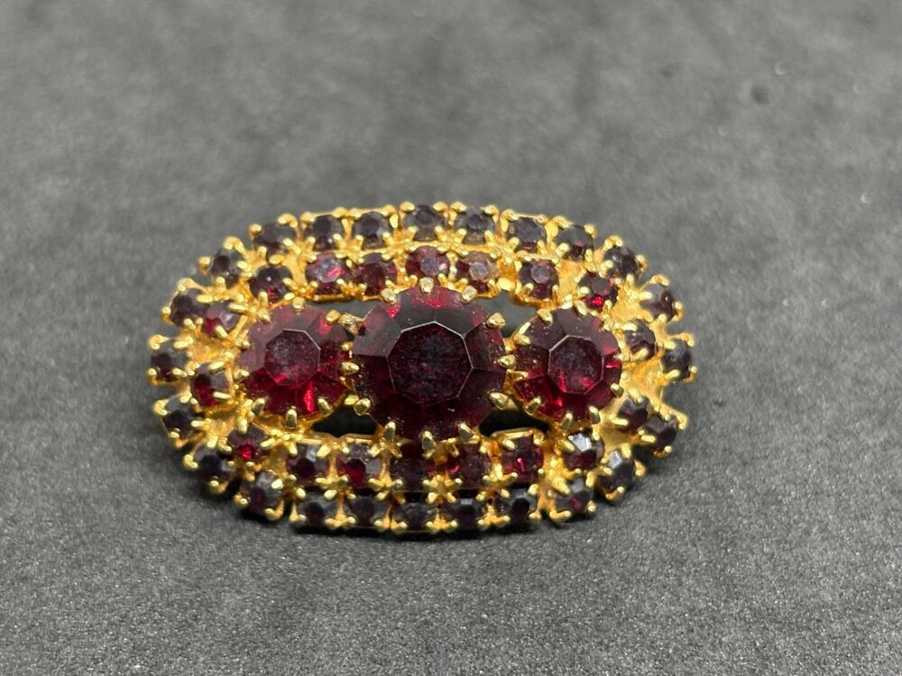 Vintage Czech Oval golden Brooch with Ruby Red Glass Rhinestone Faux Garnet